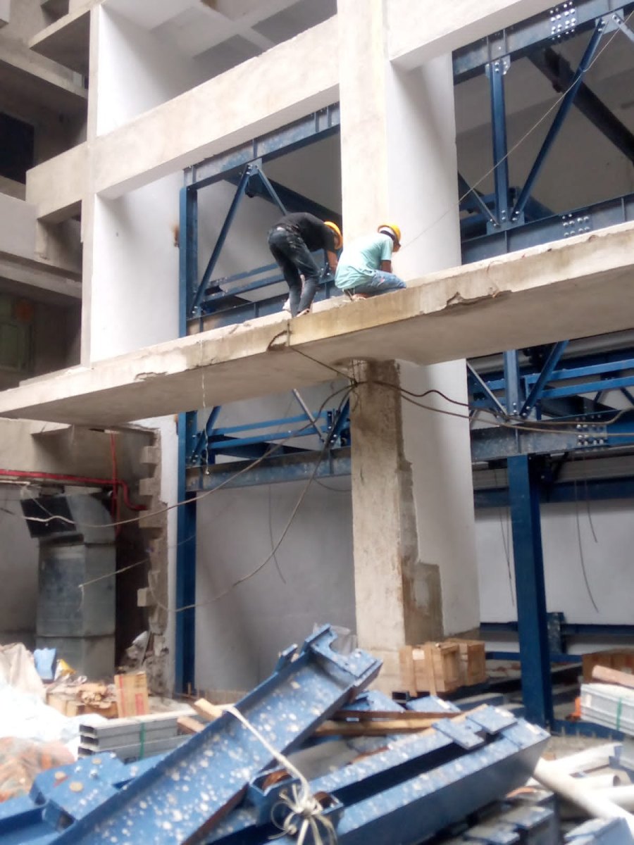 Kwality Infosolution technicians at the Ashar Metro Tower site